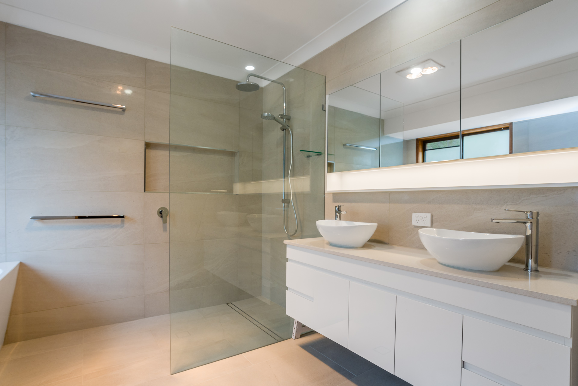 river city constructions dual sink bathroom and open shower